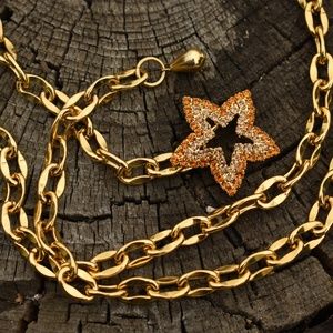 VINTAGE TRINA TARANTINO BELT LARIAT NECKLACE STAR